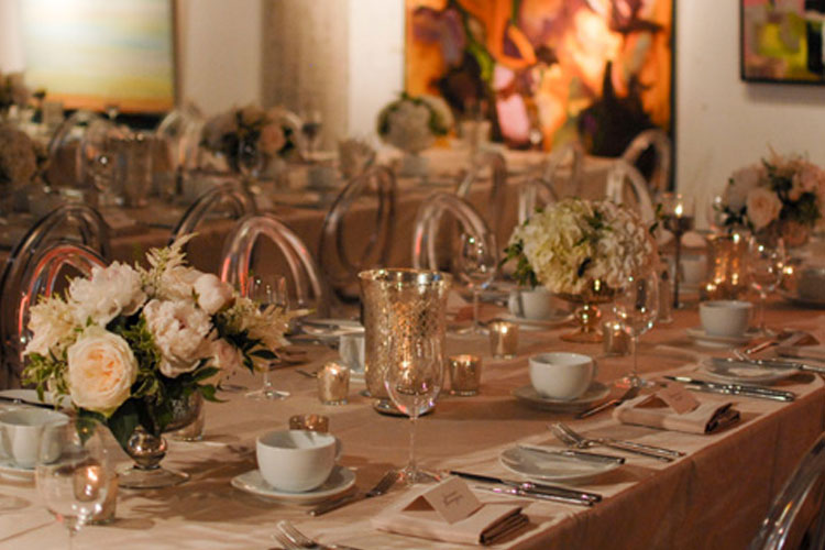 Wedding tables and decor setup for event at Arta Gallery venue