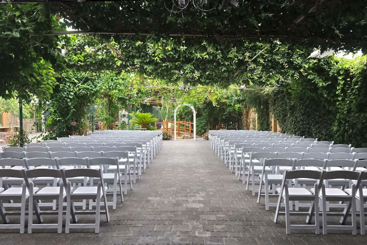 Madison Greenhouse Wedding Venue Ceremony Seating and Wedding Altar